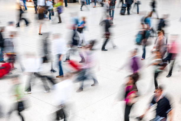 istock People walking in railroad station 1443820827