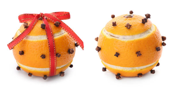 Pomander balls made of tangerine and cloves on white background, collage. Banner design Pomander balls made of tangerine and cloves on white background, collage. Banner design scent container stock pictures, royalty-free photos & images