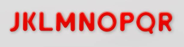 istock 3D Red plastic uppercase letters J, K, L, M, N, O, P, Q and R with a glossy surface on a gray background. 1443826077