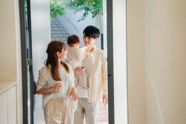 Young family going out with their baby