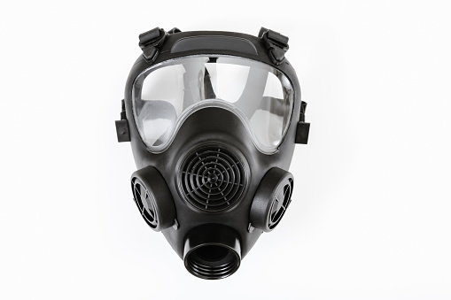 Black rubber gas mask without filter on white background. Front view