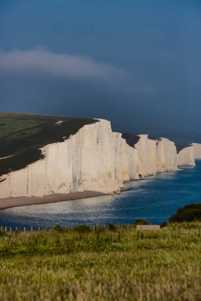 istock Seven Sisters Cliffs glowing on a hazy summer day 1443841417