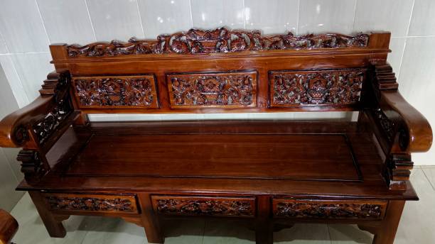 istock carved teak wood chairs 1443845801