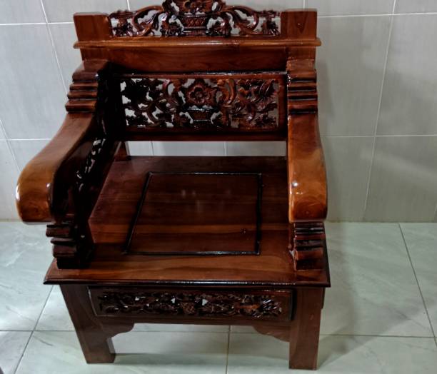 istock carved teak wood chairs 1443845808