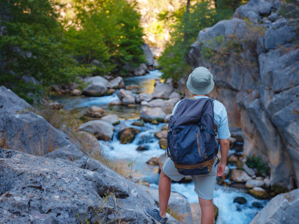 Turkey travel, mediterranean area on a warm summer day, man hike in Yazili Canyon National Park