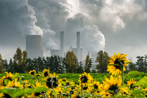 Coal power plant and environmental pollution with surrounding nature in Germany, Bergheim.