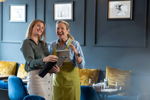 istock Employees Discussing in Restaurant 1443853746