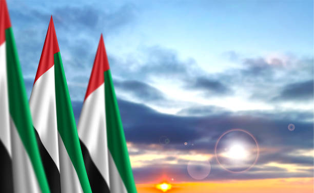 istock UAE flag on background of sunset or sunrise. Concept for National Holidays 1443858054