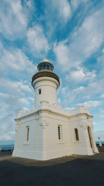 Byron bay lighthouse at sunset stock photo