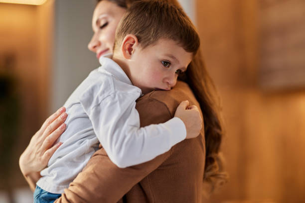 istock Loving mother consoling her sad son at home. 1443862533