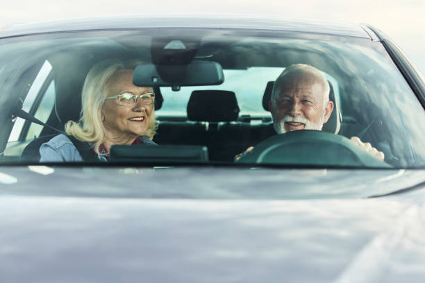istock Happy mature couple going on a road trip by car. 1443864608