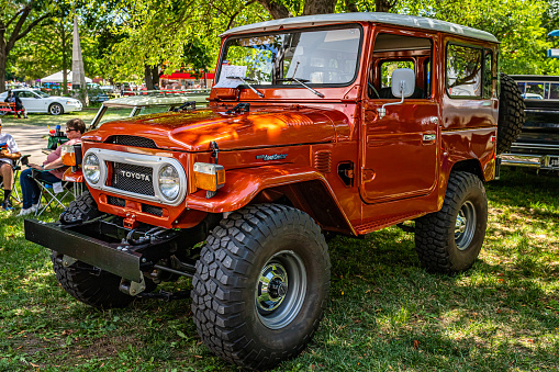 Des Moines, IA - July 03, 2022: High perspective front corner view of a 1976 Toyota Land Cruiser FJ40 at a local car show.