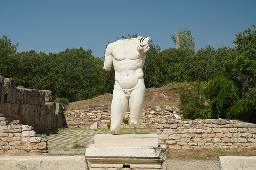 Statue in Hadrianic Baths in Aphrodisias Ancient City in Geyre, Aydin, Turkiye