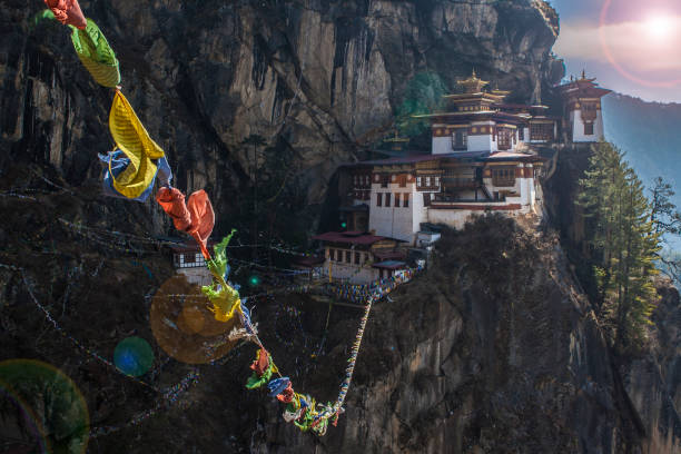 Bhutanese Temple The old Bhutanese temples are in the beautiful valley among Himalaya Mountain. This is wonderful tourist attraction. The view like a dream. tibet culture stock pictures, royalty-free photos & images