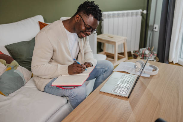 istock Young African American man attends an online course 1443885637
