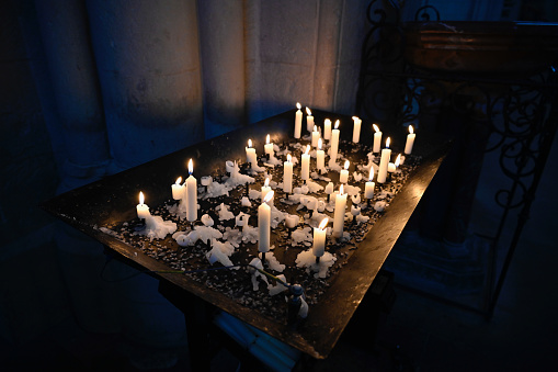 Burning candles in a church