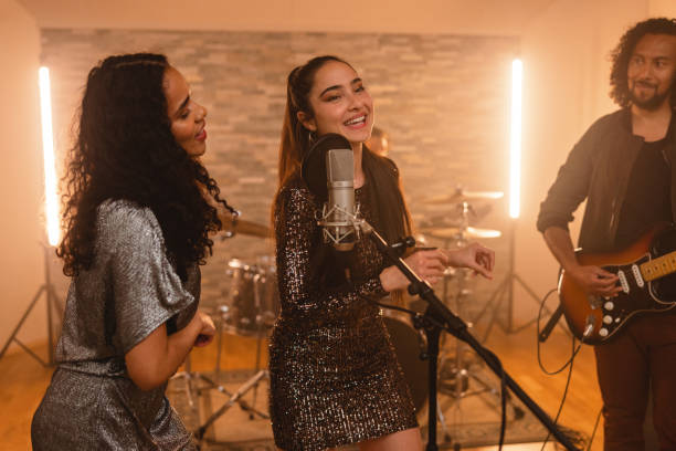 istock Diverse Band Recording A Song In A Beautiful Music Studio 1443887078