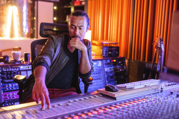 istock Black Male Audio Engineer Working On Sound Adjustments In A Recording Studio 1443887180