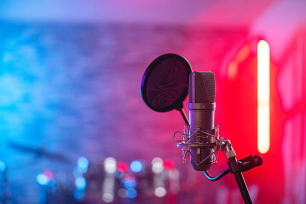 istock A Close Up Of A Microphone In A Recording Studio Illuminated By Red And Blue lights 1443887342