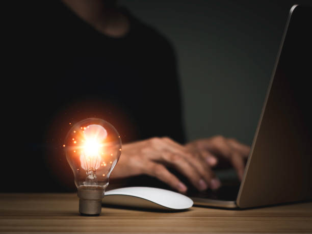 istock Businessman holding a light bulb, Creative new idea. Innovation, brainstorming, solution and inspiration concepts. imagination, creative thinking problem solving. 1443899320