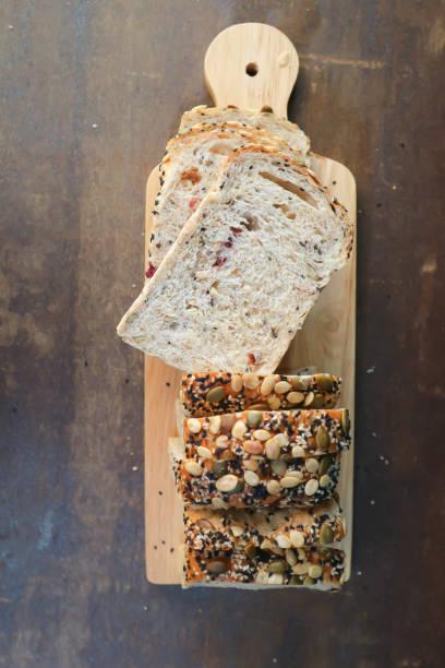 istock bread , whole wheat bread or nut bread or loaf of bread or cut bread 1443899947