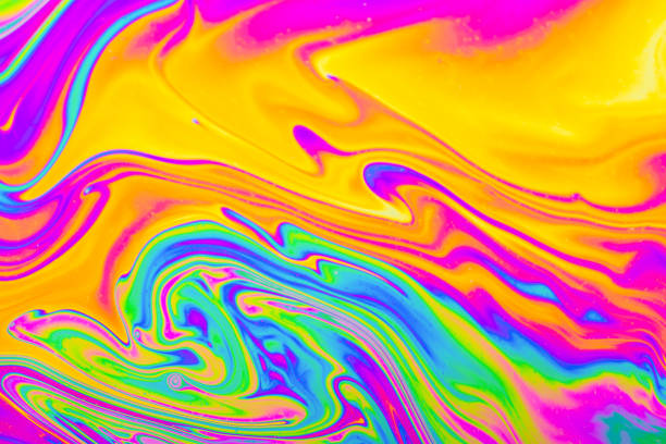istock Psychedelic multicolored background abstract. Rainbow colors. patterns background. Photo macro shot of soap bubbles 1443902579