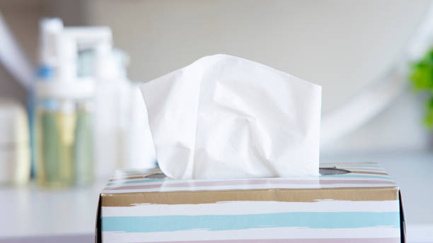 istock Light color napkin tissue box on white background. Cold and flu concept. 1443903402