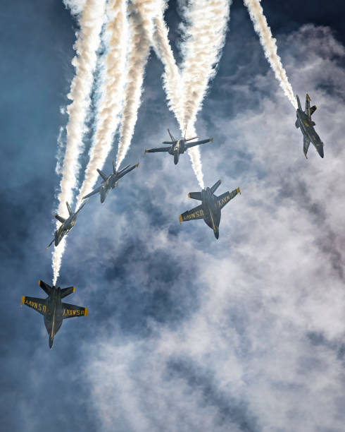 Angels Diving San Diego, California, USA - September 24, 2022: The US Navy Blue Angels, dive toward Earth with smoke on, at the 2022 Miramar Airshow. miramar air show stock pictures, royalty-free photos & images