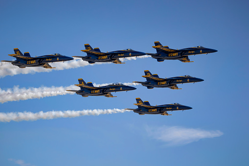 San Diego, California, USA - September 24, 2022: The US Navy Blue Angels perform, with smoke on, at the 2022 Miramar Airshow.