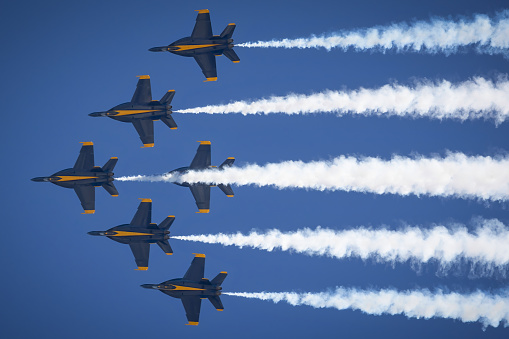 San Diego, California, USA - September 23, 2022: The US Navy Blue Angels, directly above at the top of a loop, at the 2022 Miramar Airshow.
