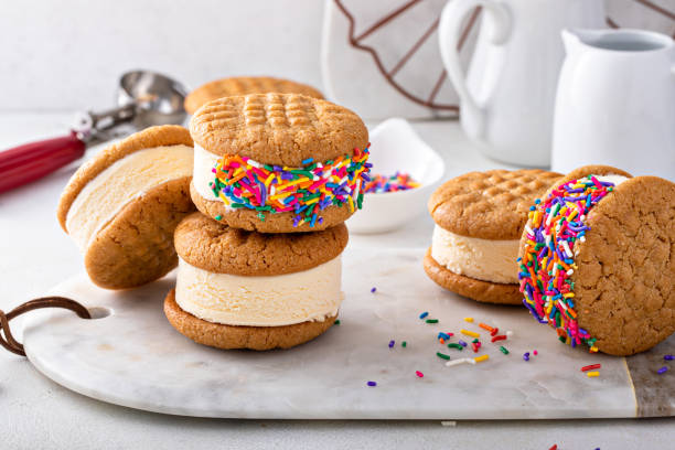 istock Ice cream and cookies sandwiches stacked on the table 1443907867