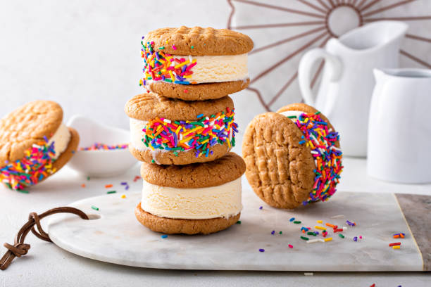 istock Ice cream and cookies sandwiches stacked on the table 1443907875