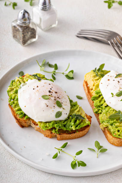 istock Avocado toast with a poached egg on top 1443907944