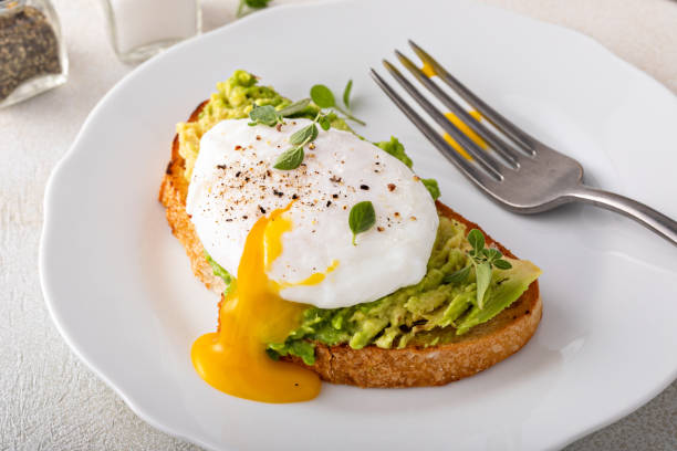 istock Avocado toast with a poached egg on top 1443907956