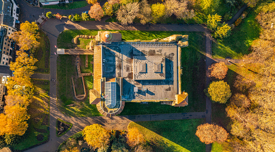 Aerial photo from a drone of Colchester Castle in Essex, UK. This photo was captured in November 2022. Colchester Castle is a Norman castle in Colchester, Essex, England, dating from the second half of the eleventh century. The keep of the castle is mostly intact and is the largest example of its kind anywhere in Europe, due to its being built on the foundations of the Roman Temple of Claudius, Colchester.