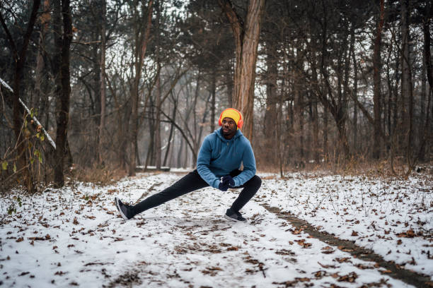 istock Man exercising in the forest 1443910590