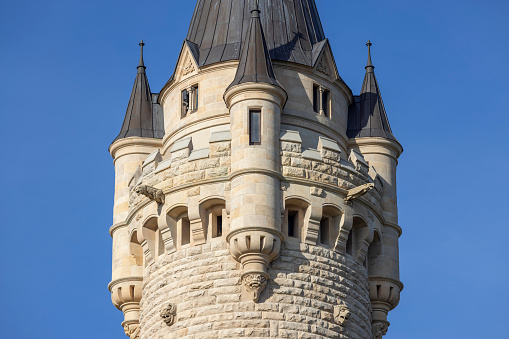 Moszna, Opole, Poland - November 12, 2022: 17th century Moszna Castle, one of the best known monuments in western part of Upper Silesia. View of decorative tower