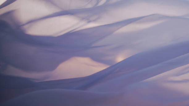Close-up White transparent fabric waving on the wind stock photo