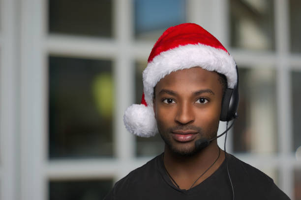customer service operator santa hat support center open during christmas stock photo