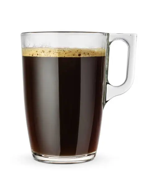 Coffee americano in a transparent glass cup isolated on a white background.