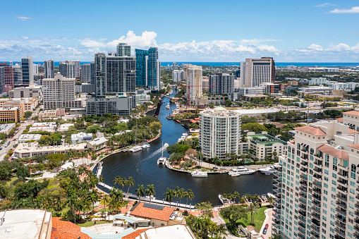 Aerial drone view of Sailboat Bend neighborhood in Fort Lauderdale, view of the North fork new river, yachts, modern buildings, tropical vegetation