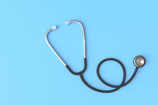Stethoscope on blue background with copy space. 3d render illustration