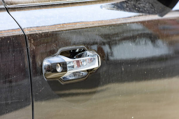 istock Close up to a metallic car door handle 1443918309
