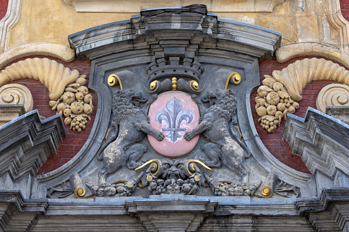 coat of arms of the city of Lille in Northern France on the facade of an old building; Lille, France