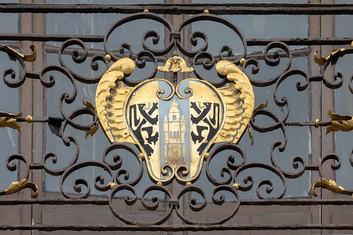 coat of arms on the facade of an old building; Lille, France