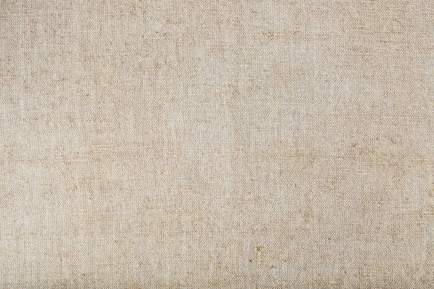 istock Natural burlap fabric with fibers as background. 1443926956