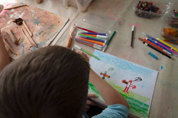istock Little boy painting 1443927084