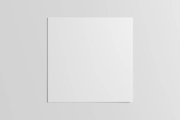 istock Square sheet of paper on the white table. 1443928863