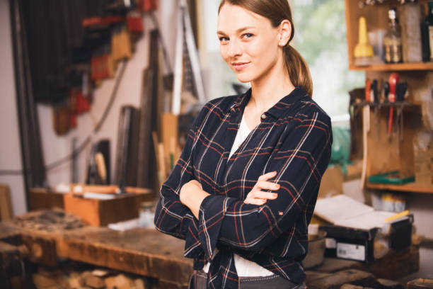 istock Portrait of a handsome female carpenter 1443936581