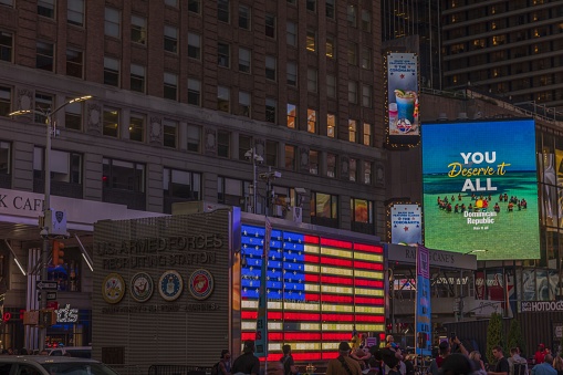 New York. USA. 09.22.2022. Beautiful view of Time Square Armed Forces recruiting station in Broadway in night.